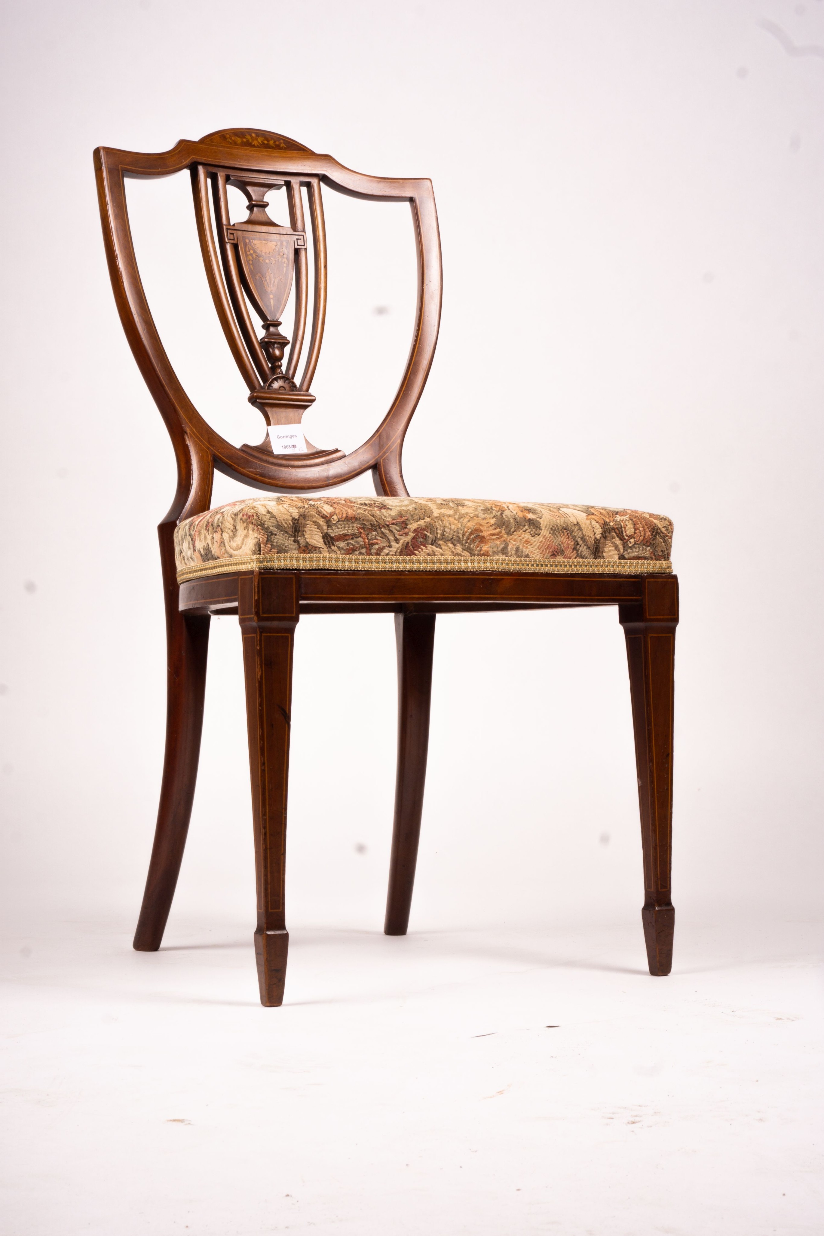 An Edwardian marquetry inlaid elbow chair (AF) and a side chair